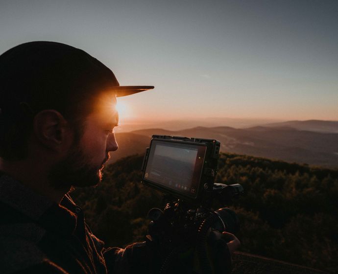 Kameramann bei Sonnenuntergang
